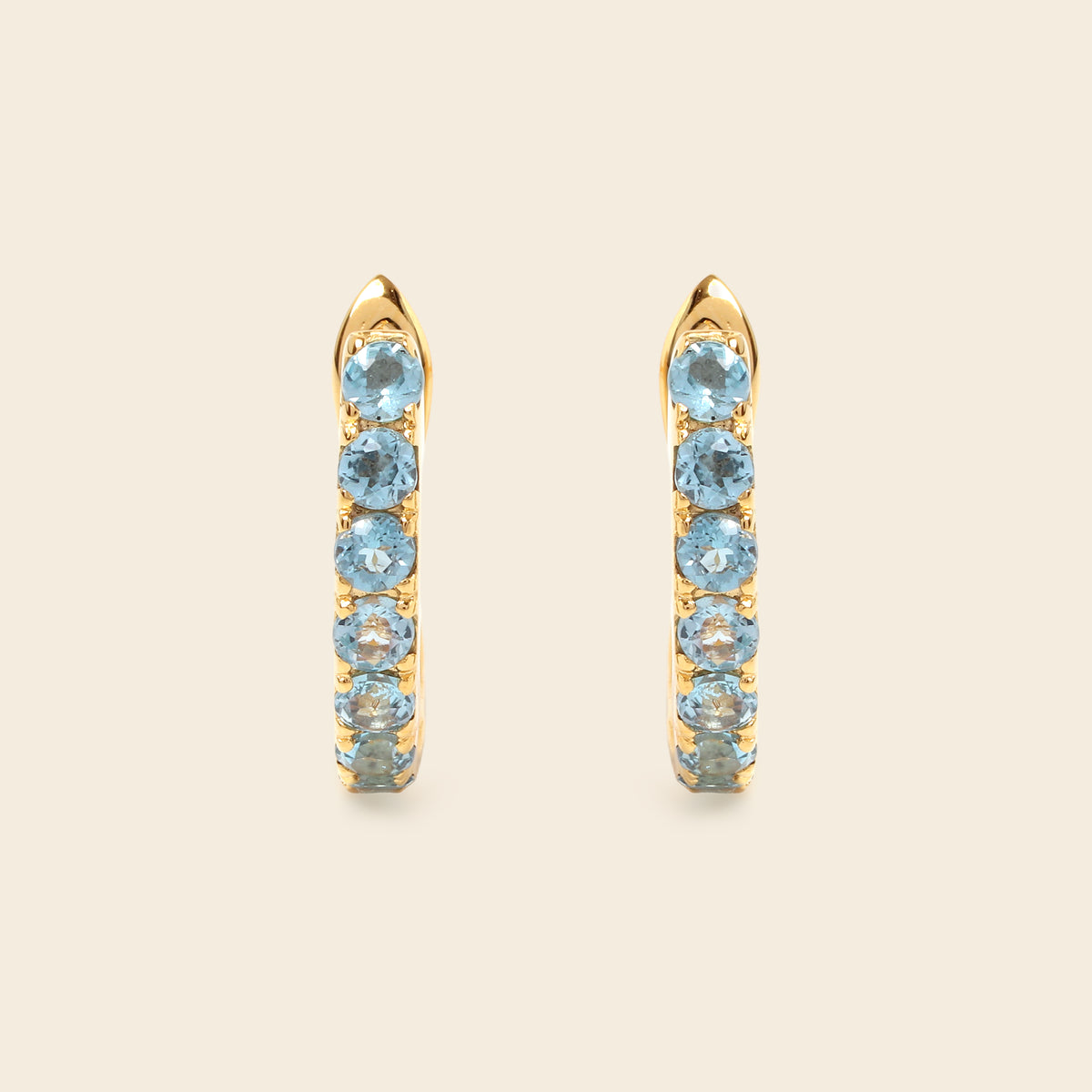Blue topaz hoop earrings with latch back closure