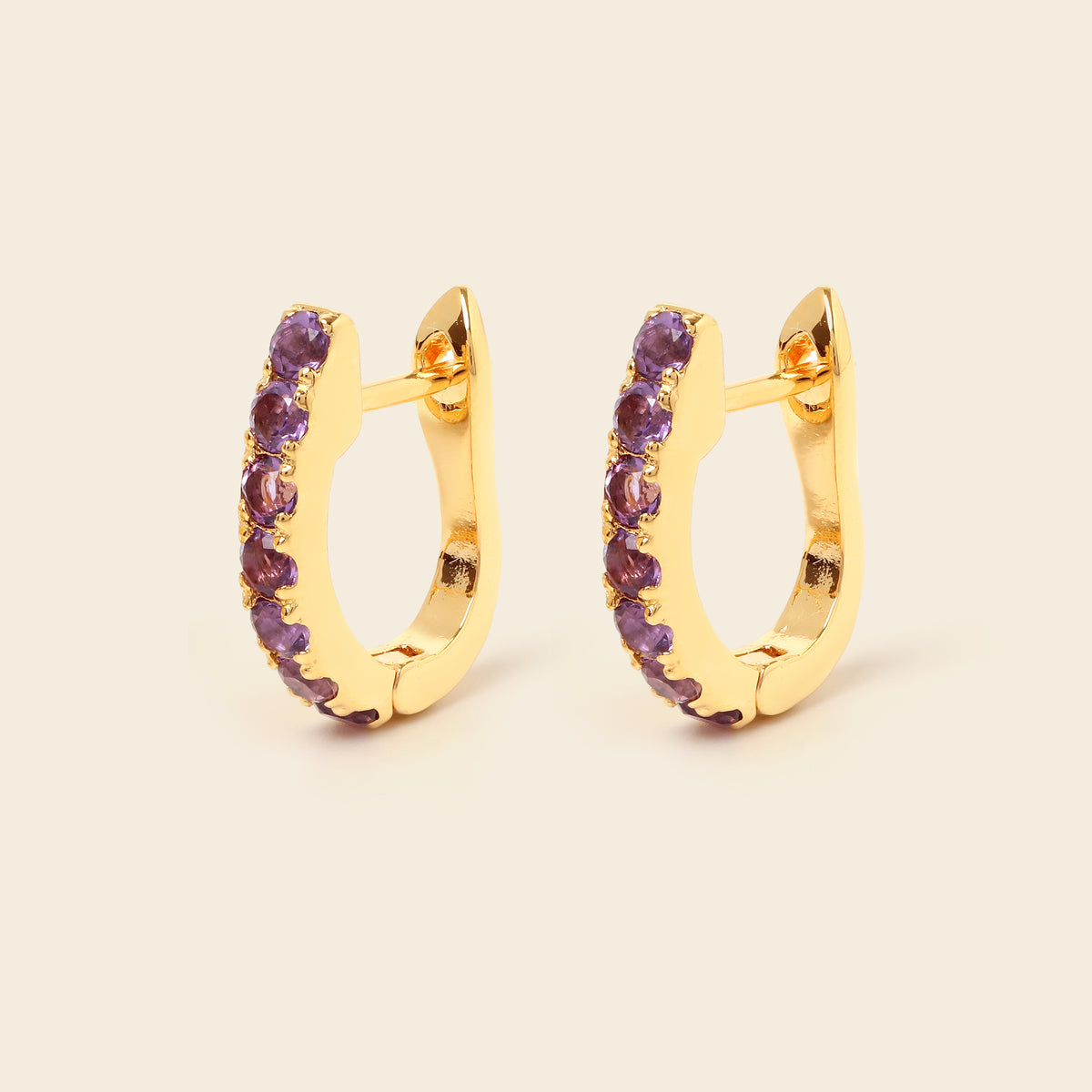 Amethyst gemstone huggie hoops in 18K gold — detail view