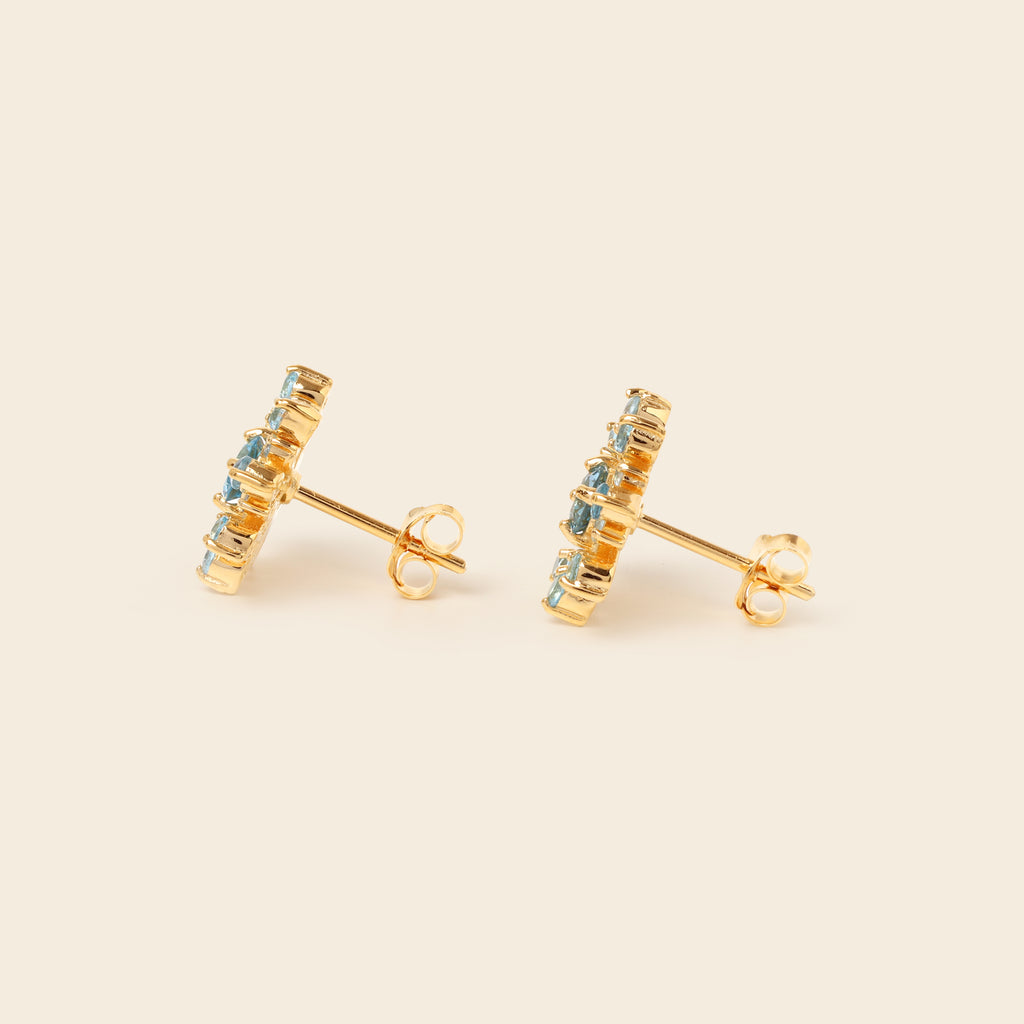 Natural blue topaz snowflake earrings handcrafted in Bangkok