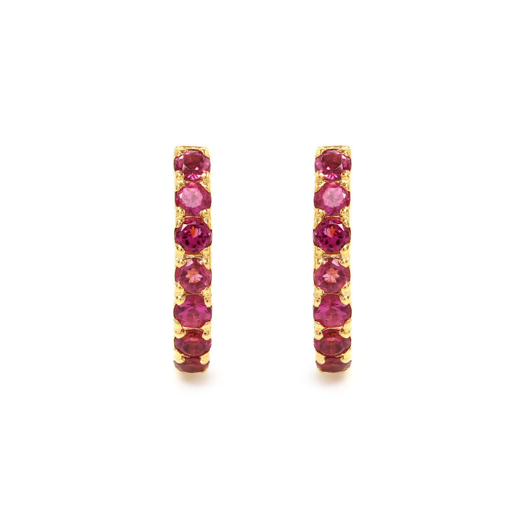 Pink tourmaline gemstone huggie hoops in 18K gold — detail view