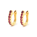Pink tourmaline huggie hoop earrings in 18K gold plated sterling silver by Jewelry By Crimson