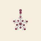Pink tourmaline gemstone snowflake pendant in sterling silver — side view