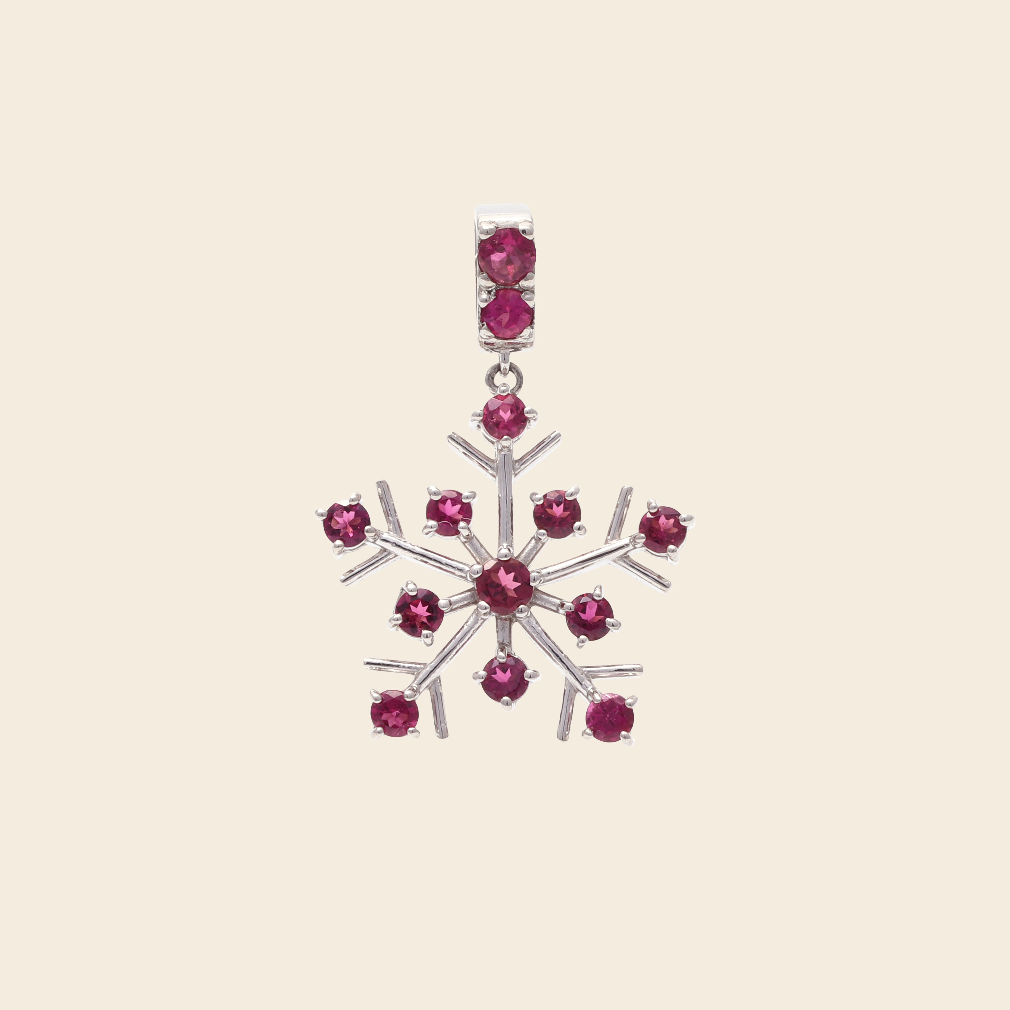 Pink tourmaline gemstone snowflake pendant in sterling silver — side view