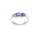 Blue-violet tanzanite seven stone ring — detail view