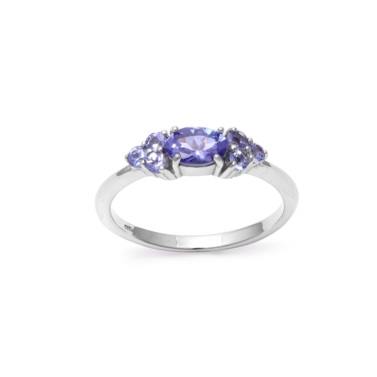 Blue-violet tanzanite seven stone ring — detail view
