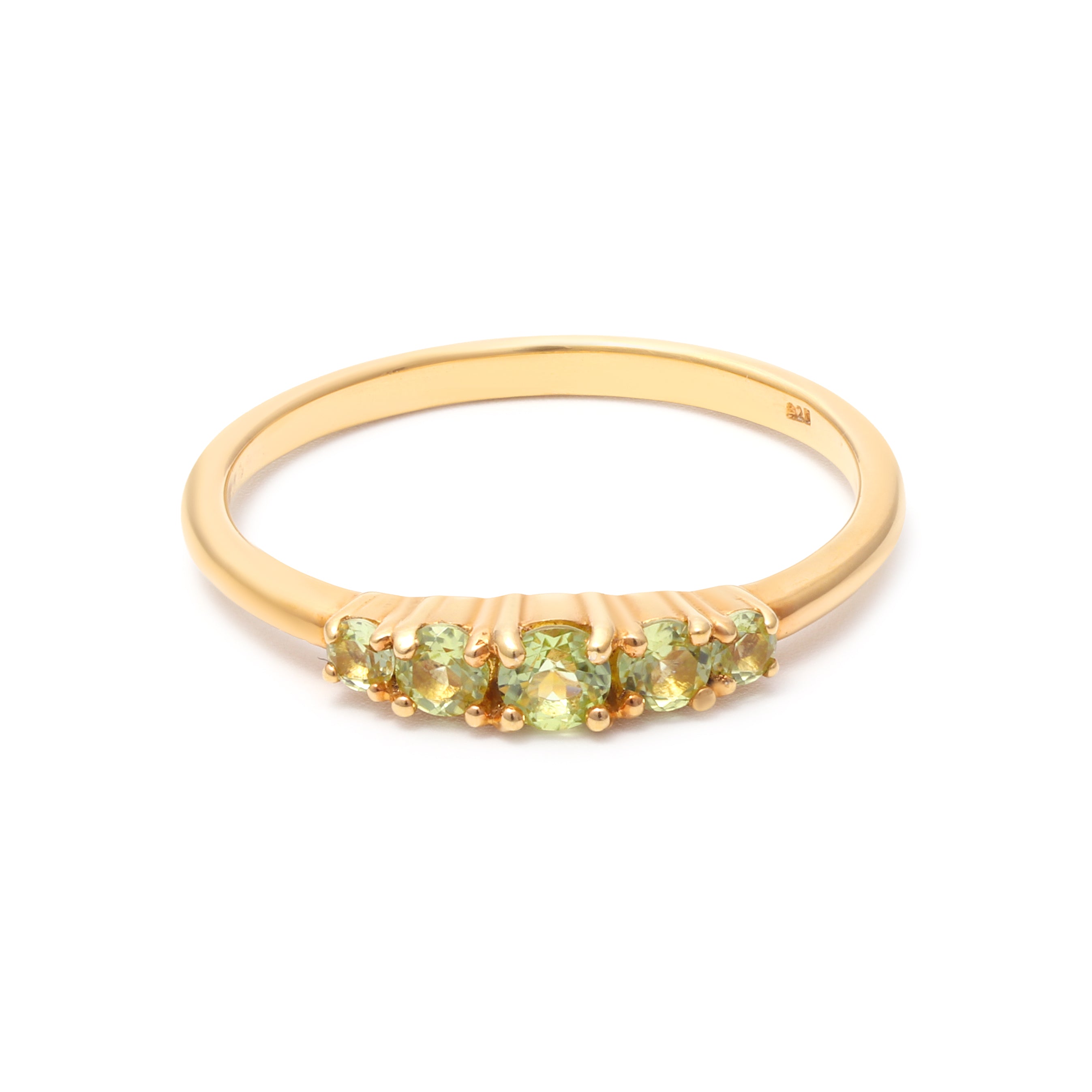 Round peridot five stone band ring in gold — detail view