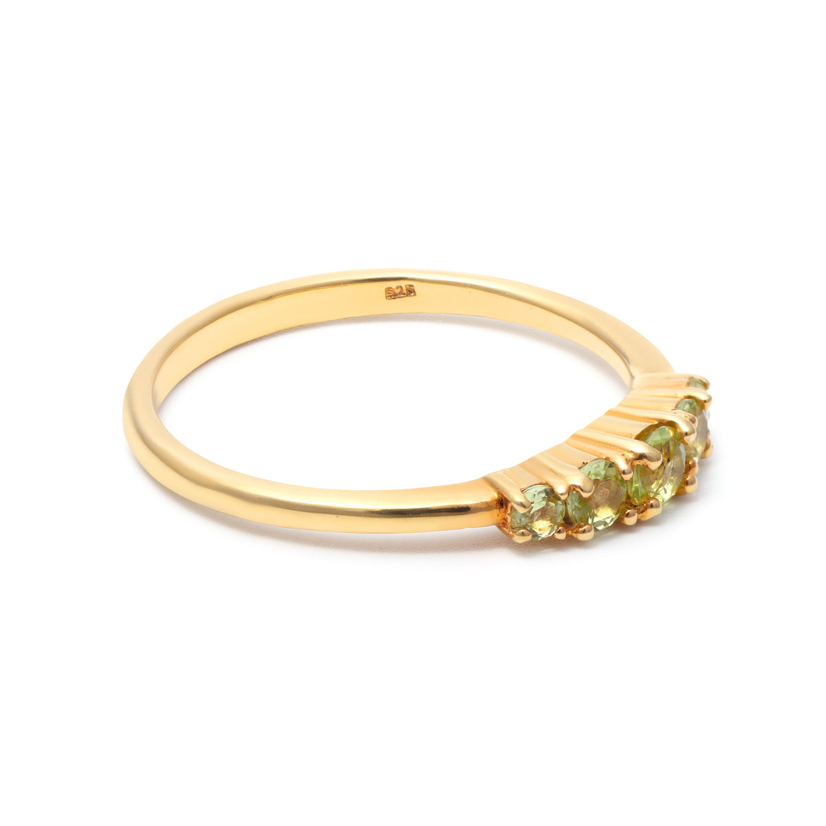Peridot gemstone band ring in gold — side view