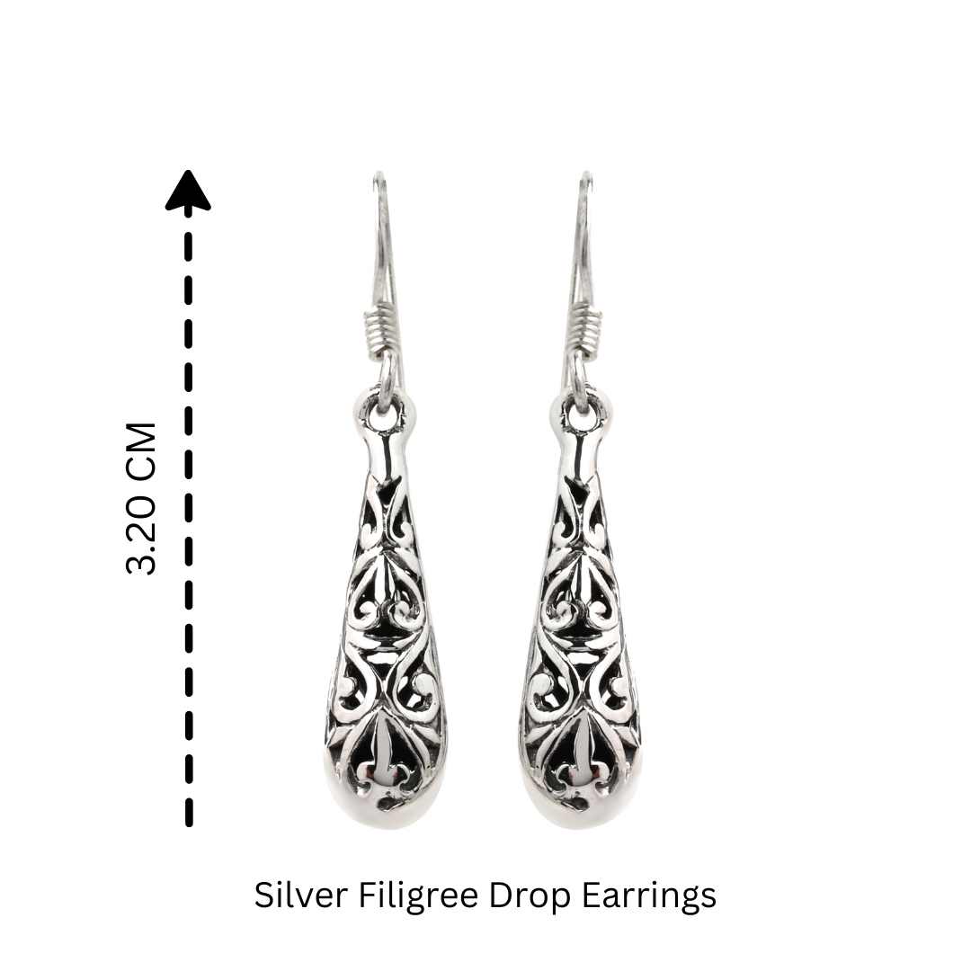 Modern silver drop earrings with artisan filigree design