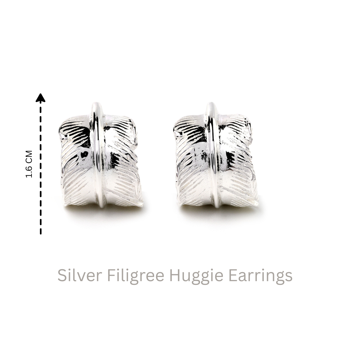 Handcrafted silver feather earrings with polished finish