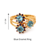 Gold ring with blue enamel flowers and gemstones, 1.7 cm height