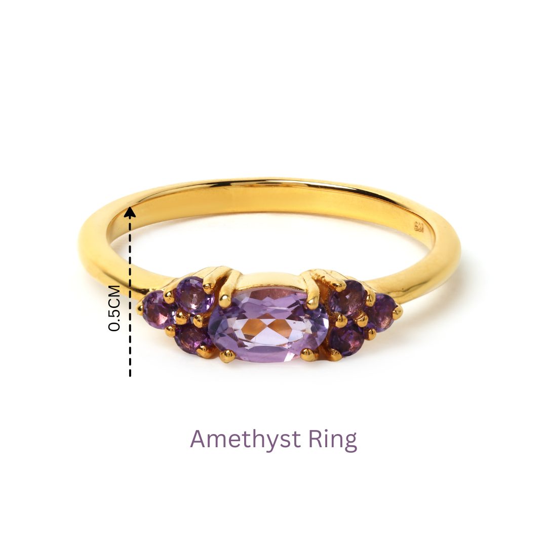Gold plated amethyst ring with oval center stone and accent gems