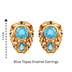Gold filigree earrings with blue topaz gemstones and red enamel accents, 2.1 cm tall