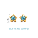 Delicate flower earrings featuring natural Blue Topaz gemstones