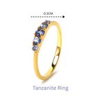 Gold ring with five blue tanzanite gemstones, 0.3cm width, elegant sterling silver jewelry design