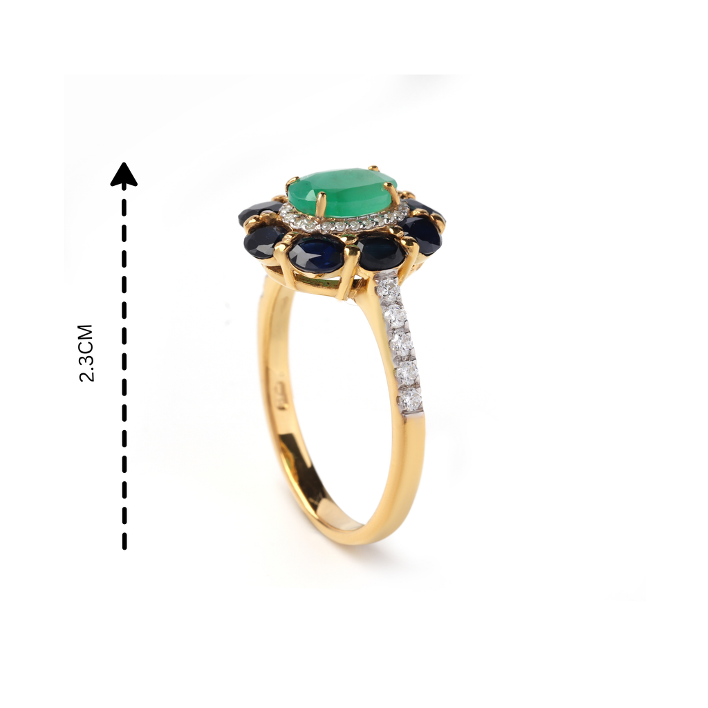 Detail of prong-set emerald and sapphire bloom design ring, gold-finished sterling silver
