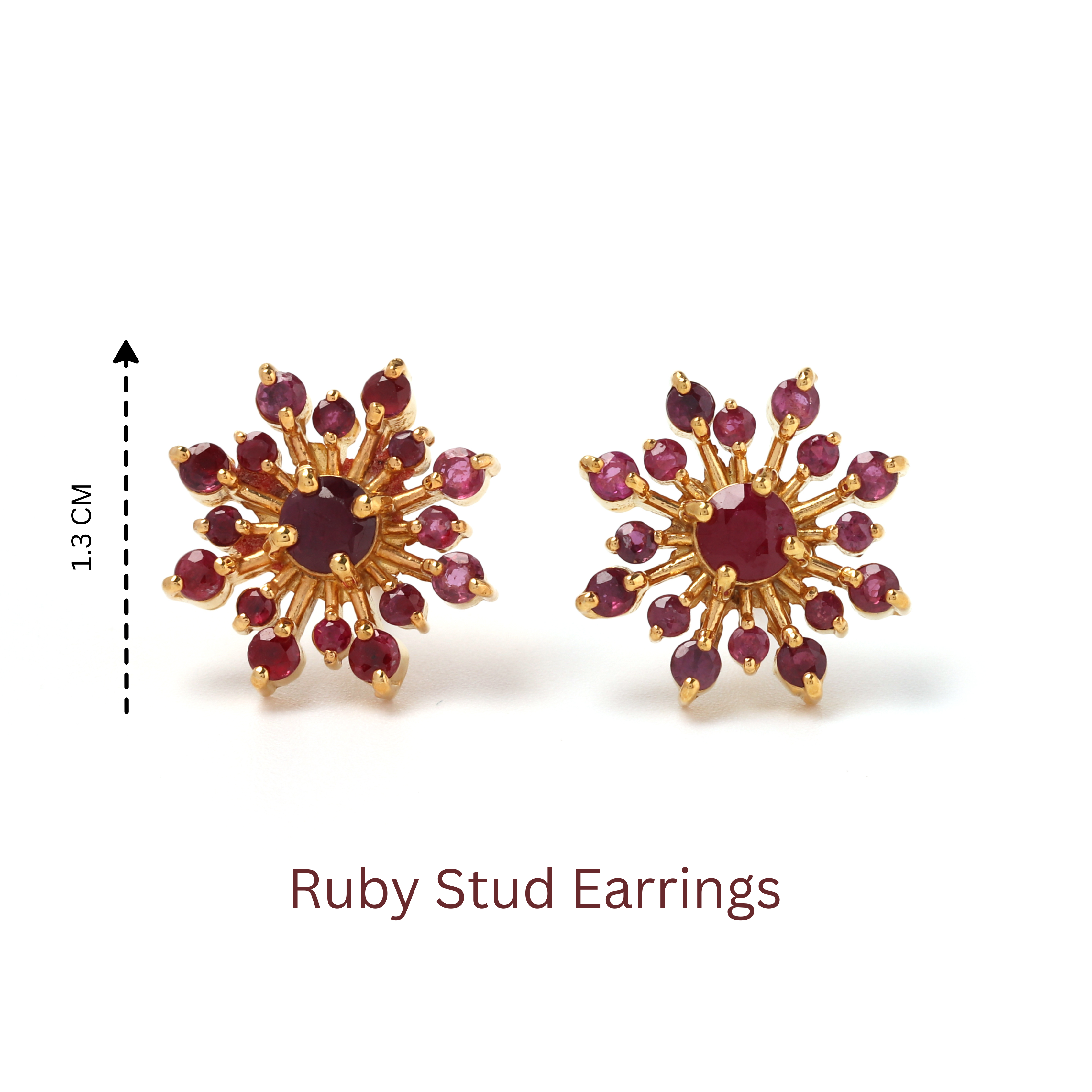 Detailed prong setting showcasing ruby gemstones on gold-finish sterling silver studs