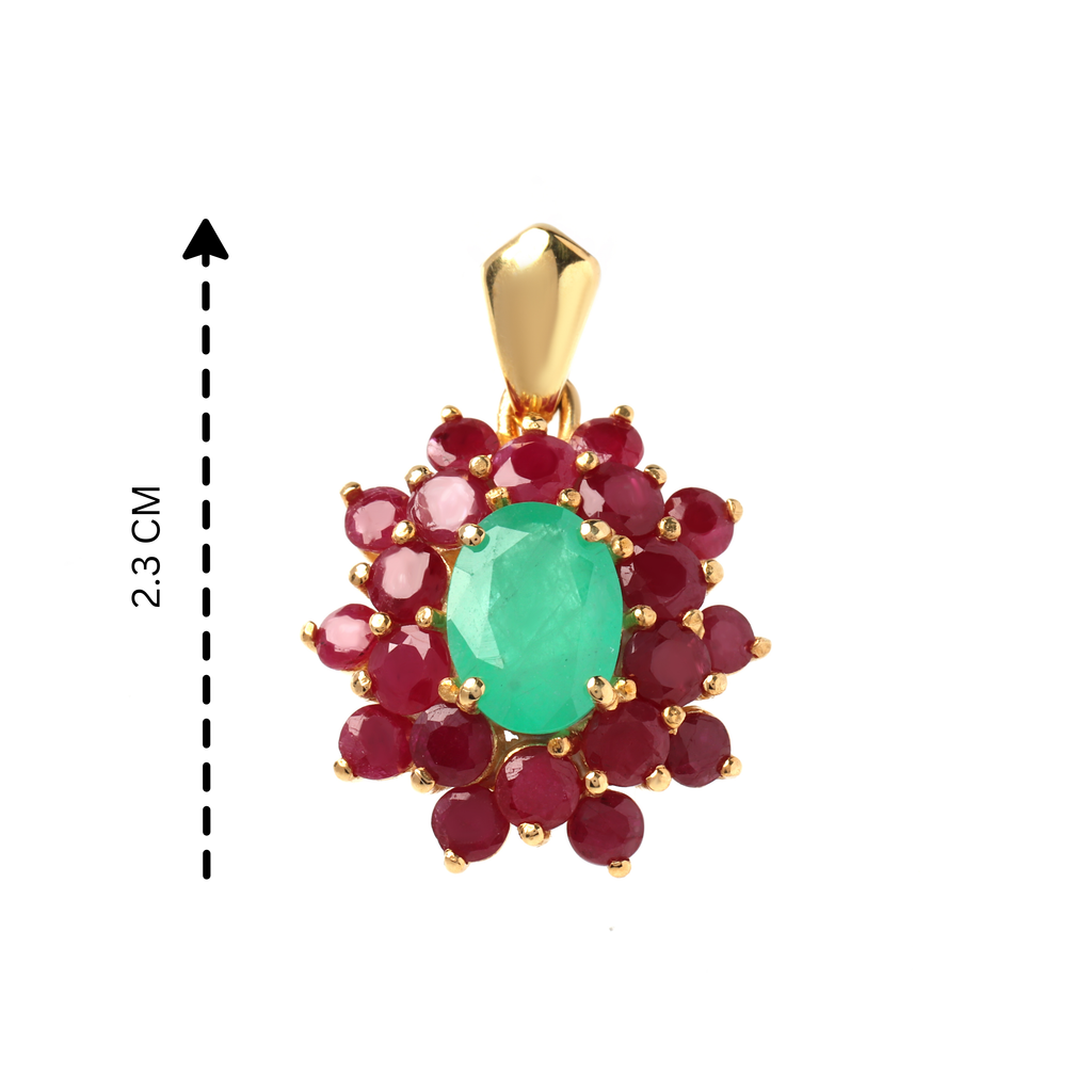 Detailed prong setting of emerald ruby silver pendant with polished gold finish by Jewelry by Crimson