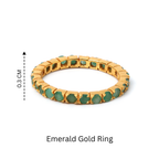 Gold ring with emerald gemstones, 0.3 cm wide, elegant stackable design