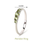 Sterling silver peridot ring with five green gemstones, 0.3cm width, elegant handmade jewelry design