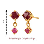 Ruby dangle drop earrings with gold setting, 1.5 cm length, featuring faceted gemstones for elegant jewelry styling