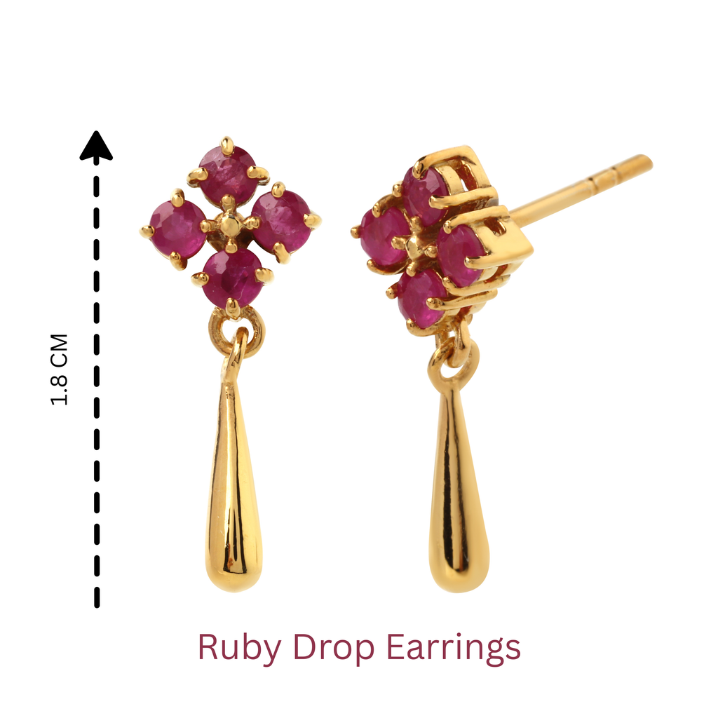 Detailed view of ruby cluster stud and smooth gold-finish drop in sterling silver earrings