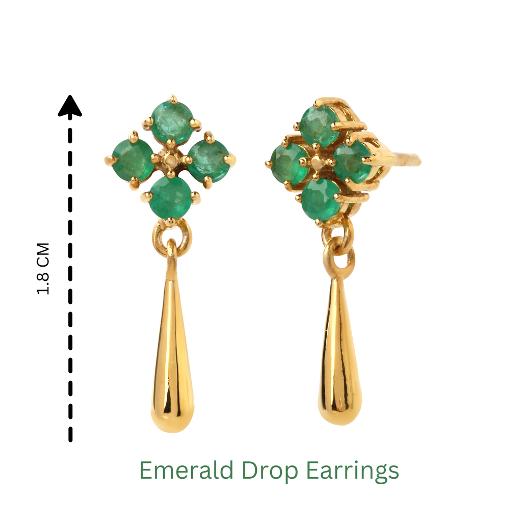 Detailed view of emerald cluster stud and smooth gold-finish drop in sterling silver earrings