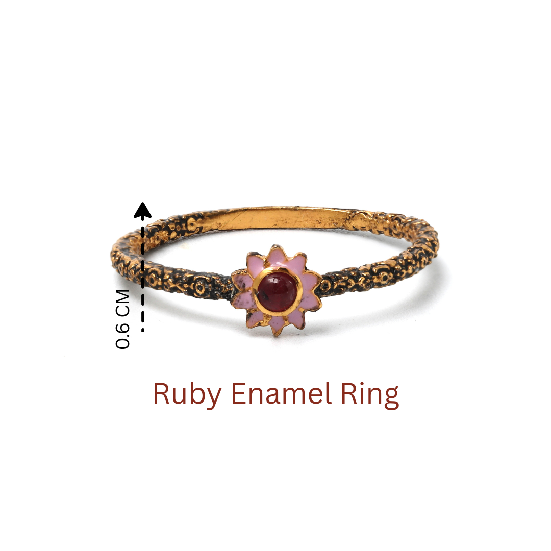 Delicate gold plated floral ring with natural ruby centerpiece