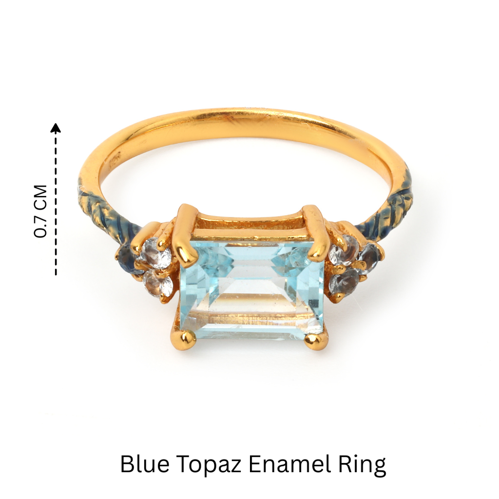 Modern blue topaz ring featuring a rectangular cut stone and accent gems