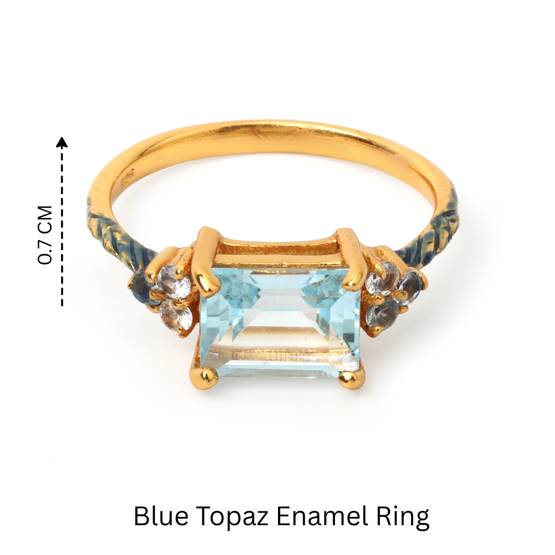 Modern blue topaz ring featuring a rectangular cut stone and accent gems