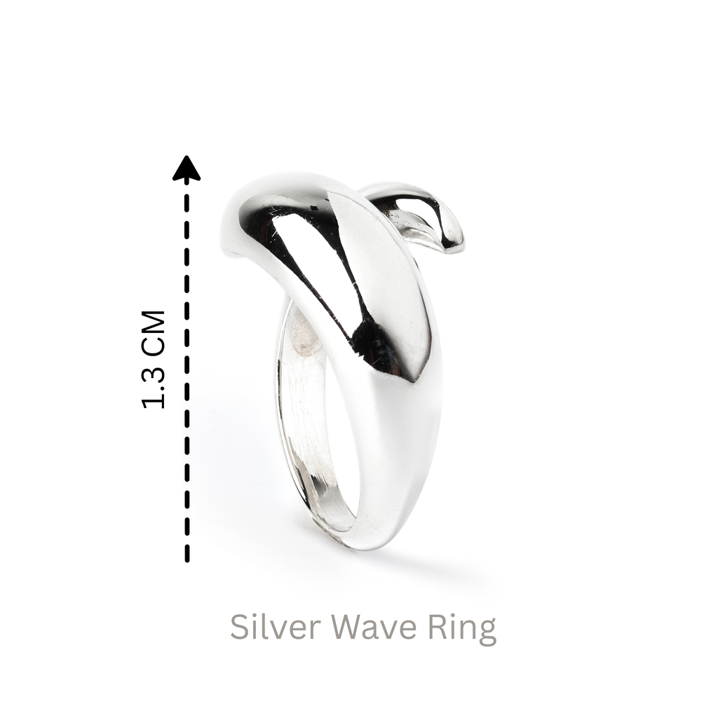 Detail view of smooth flowing wave texture on 925 sterling silver ring with mirror finish