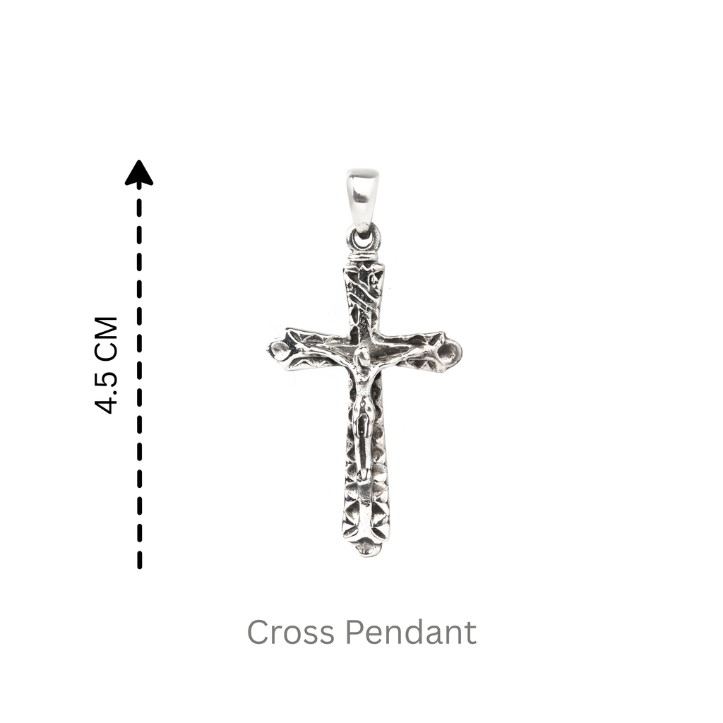 Detail view of carved texture and sculpted arms on 925 sterling silver cross pendant