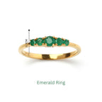Gold emerald ring with five green gemstones, 0.3cm height, elegant stacking design