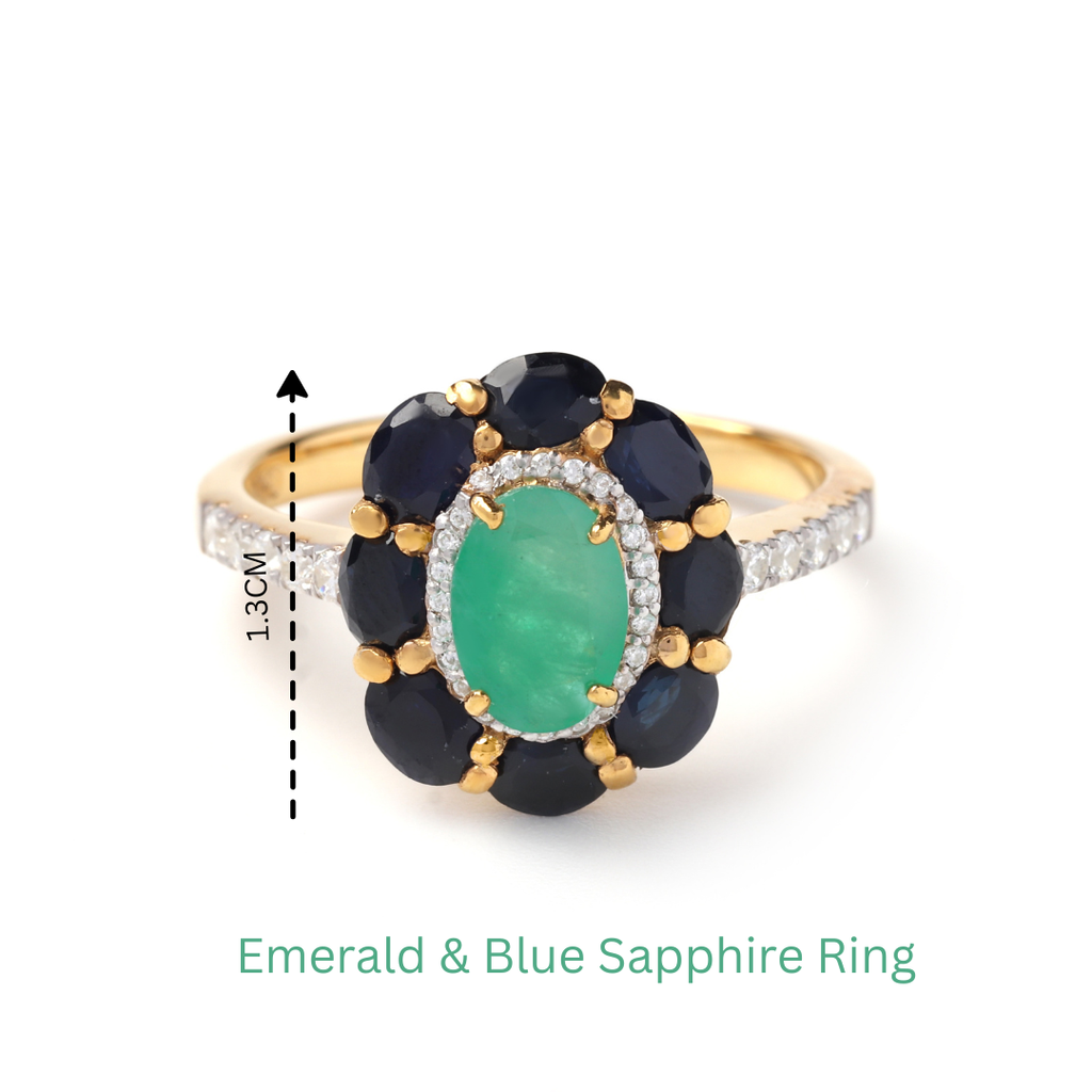 Modern emerald sapphire ring with polished gold finish