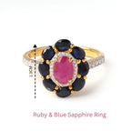 Elegant ruby and blue sapphire ring with diamond accents, 1.3cm floral design, gold band
