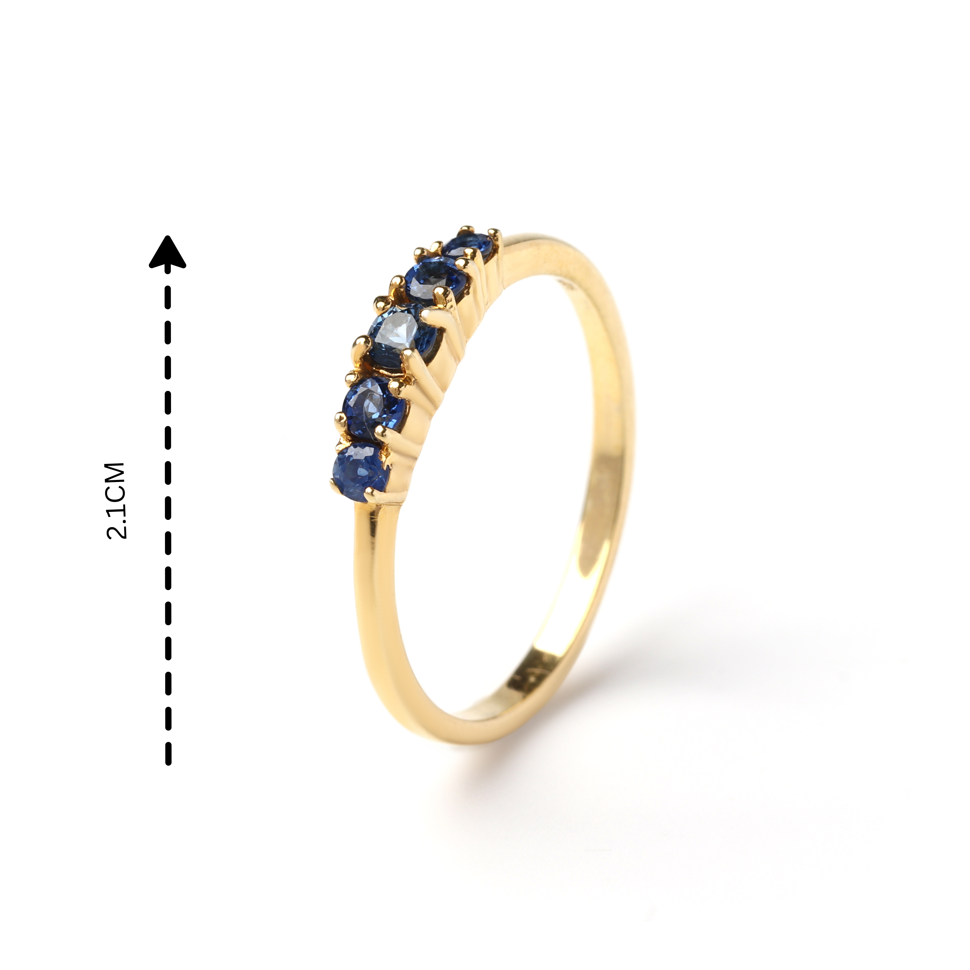 Detail view of prong-set blue sapphire gemstones on slim 925 sterling silver ring