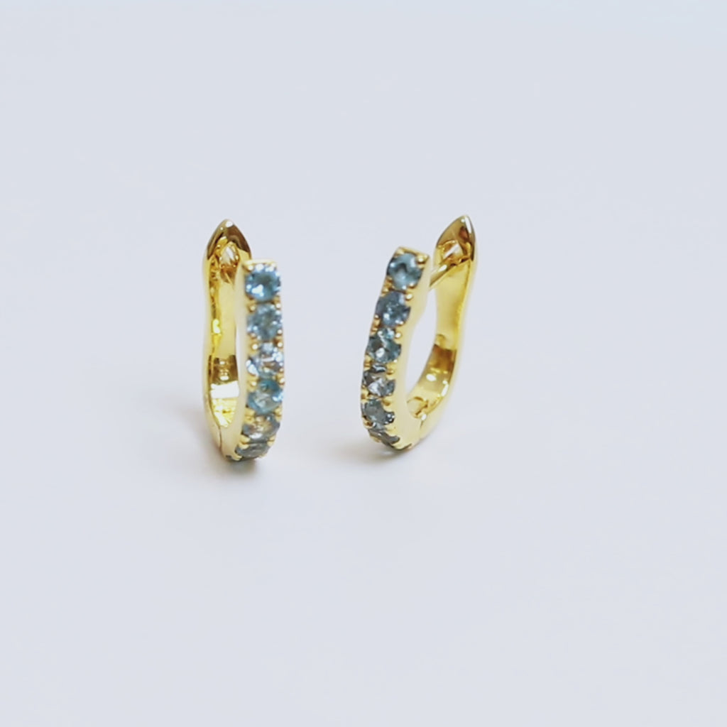 Blue Topaz Huggie Hoop Earrings in 18K Gold