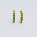 Emerald Huggie Hoop Earrings in 18K Gold