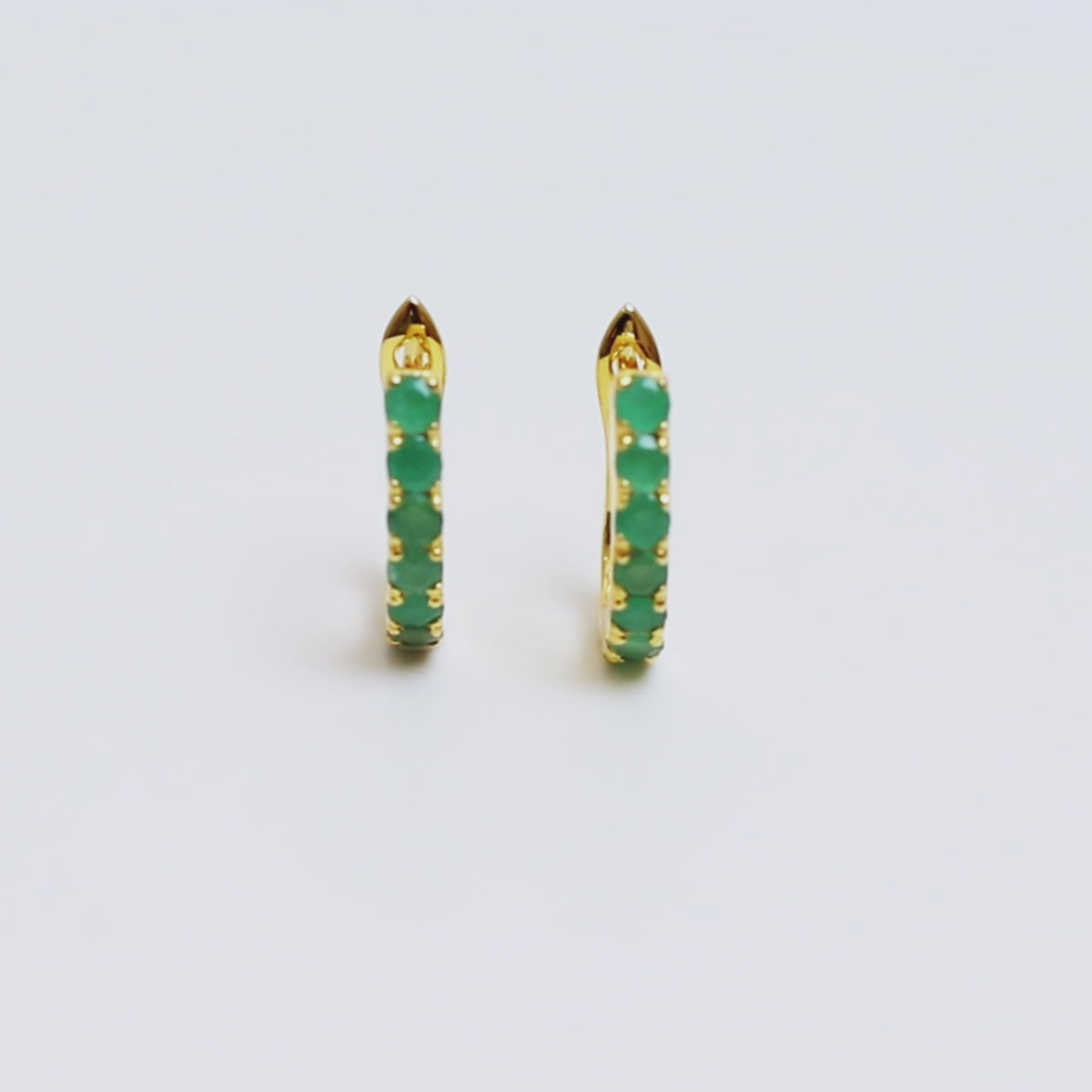 Emerald Huggie Hoop Earrings in 18K Gold
