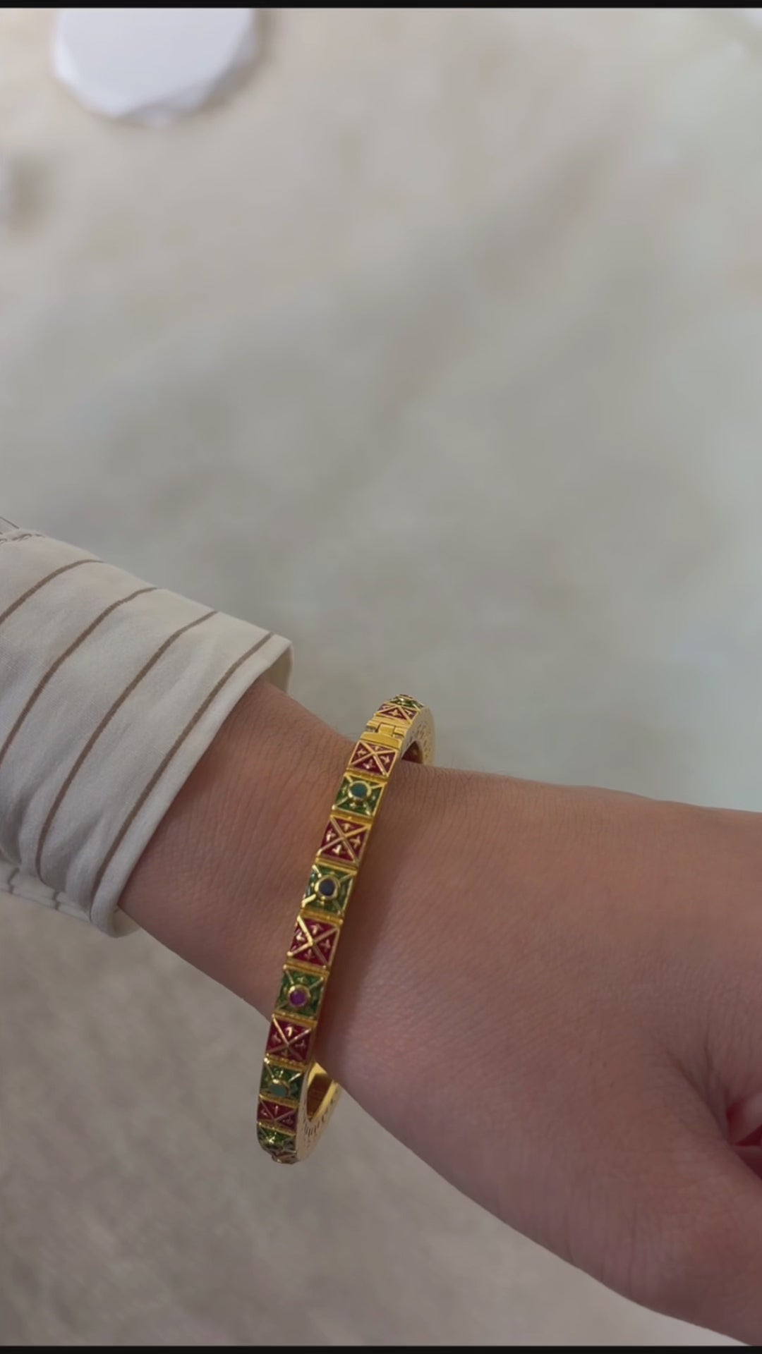 Women's gold plated multi gemstone bangle with geometric enamel design