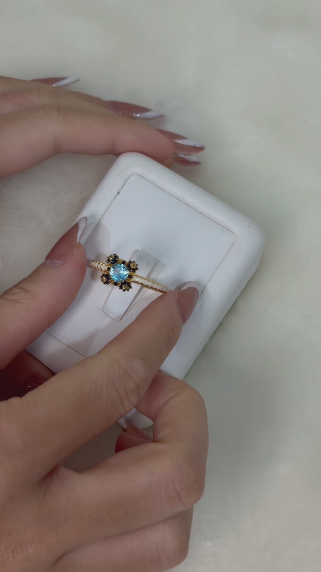 Luxury blue topaz flower ring handcrafted in Thailand