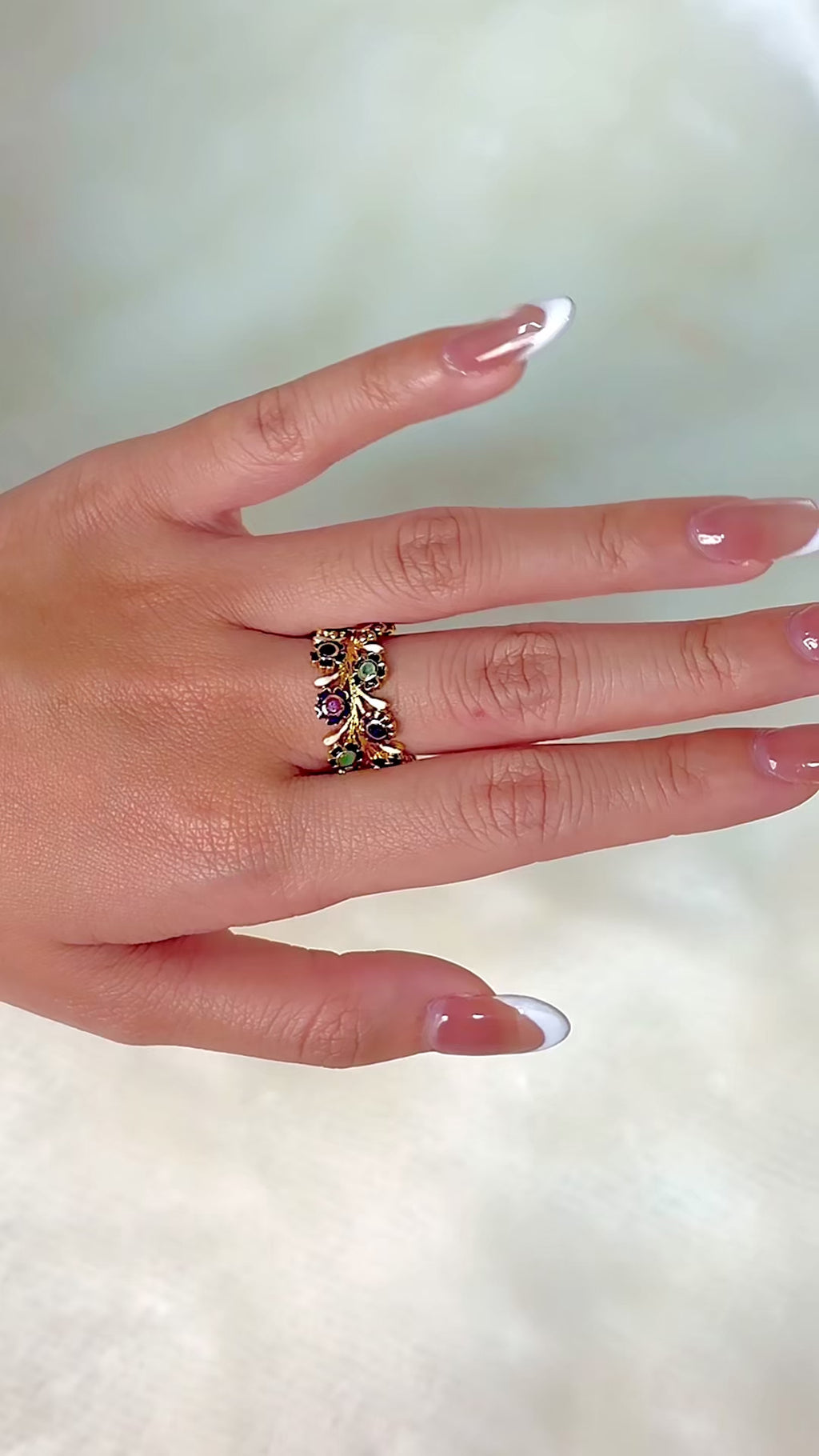 Artisan floral ring featuring natural multi gemstones