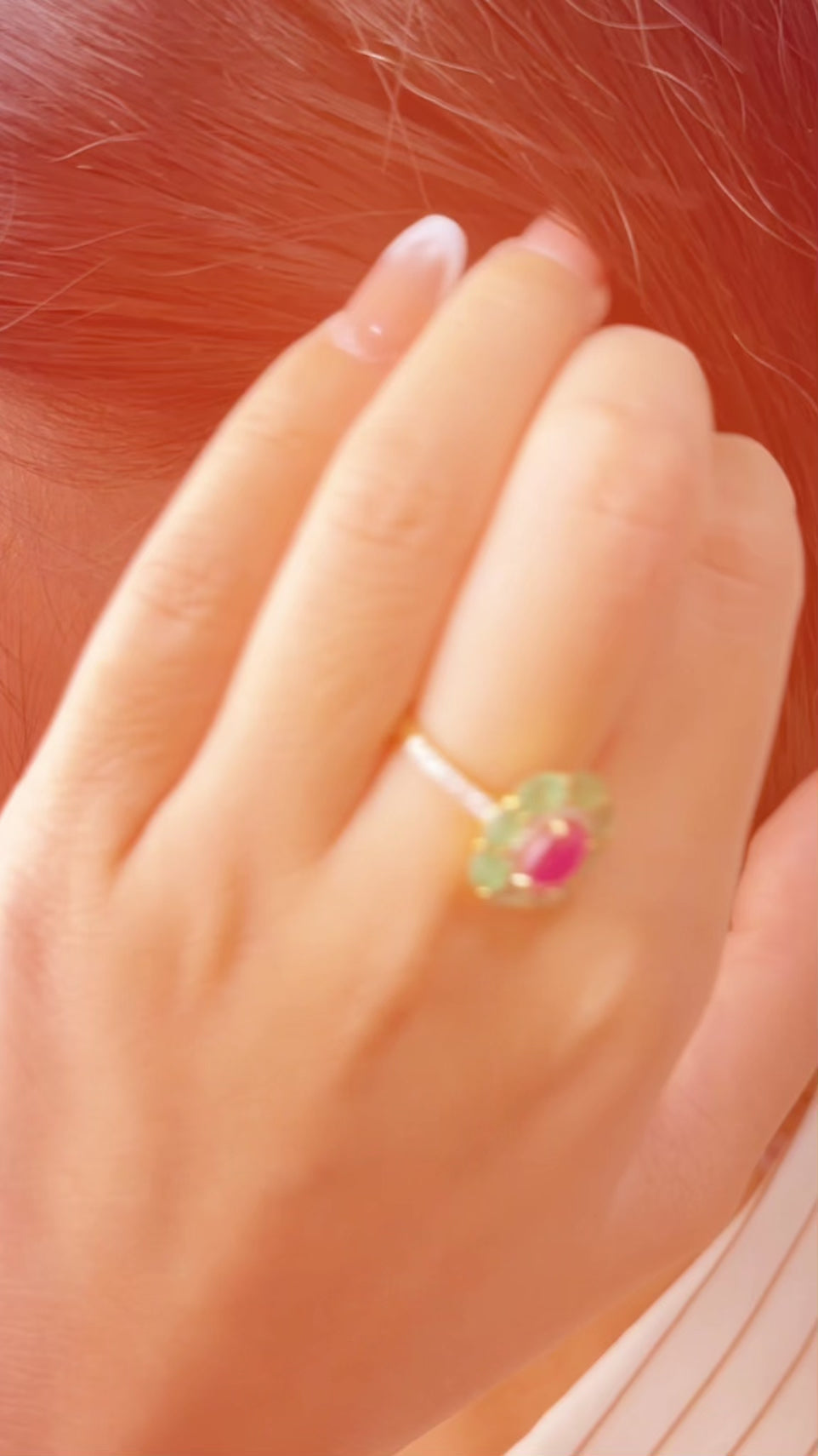 Artisan ruby flower stud earrings with polished gold finish